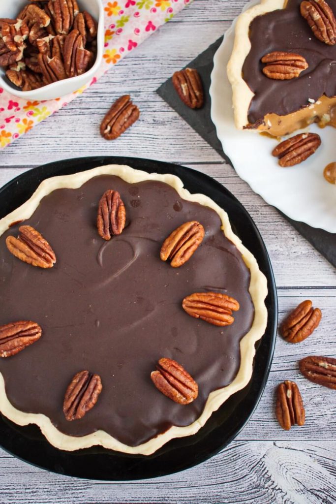 Smooth and silky caramel topped with chocolate and pecans