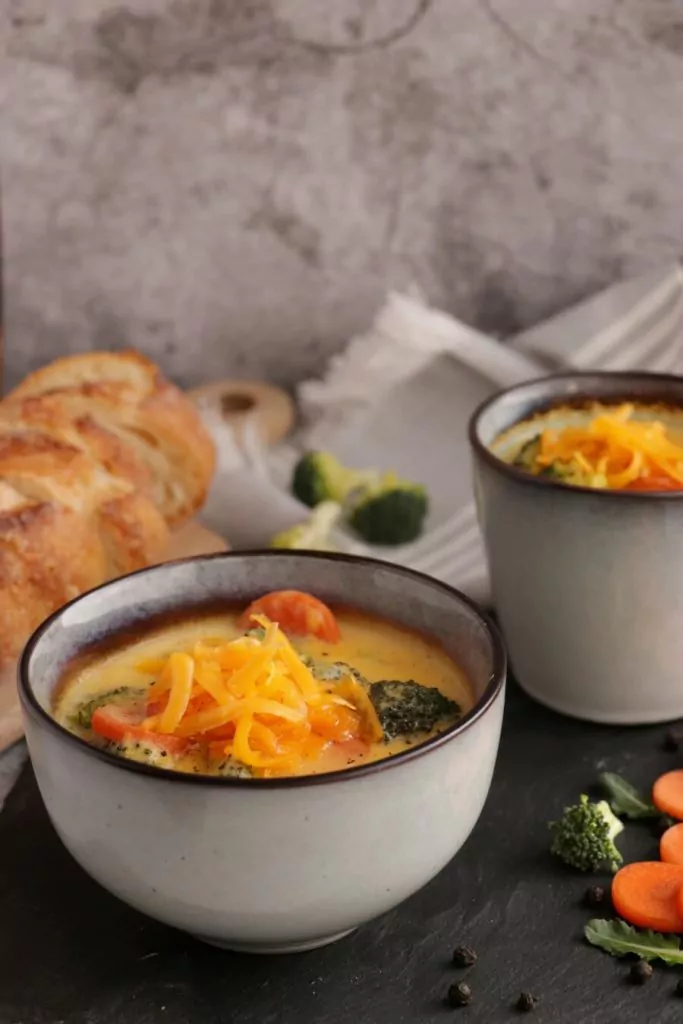 Rich and creamy broth loaded with veggies and cheese