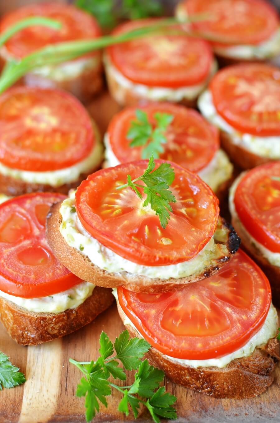 Grilled Crostini with Garlic Scape Cream Cheese and Tomatoes Recipe - COOK.ME