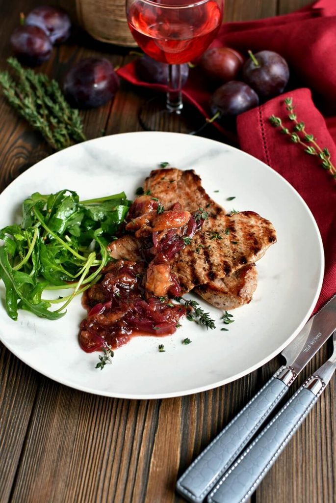 Keto Grilled Pork Chops with Plums and Arugula