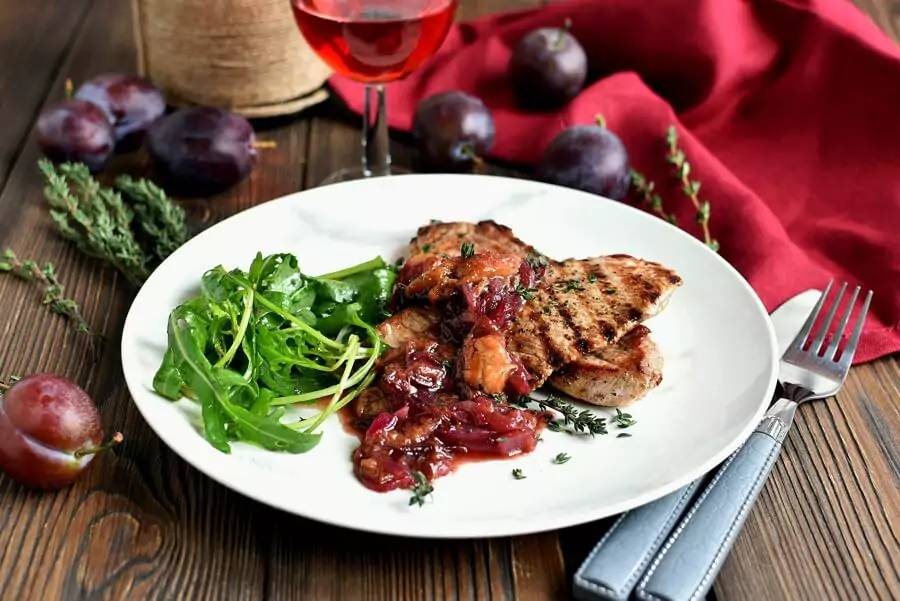 Keto Grilled Pork Chops with Plums and Arugula