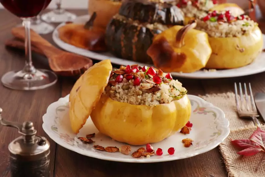 Vegan Quinoa Stuffed Squash with Walnuts and Pomegranate
