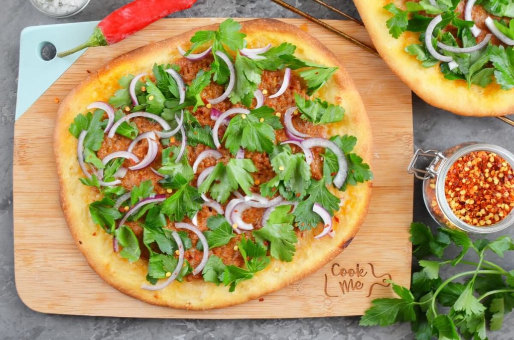 How to serve Spicy Lamb Pizza with Parsley–Red Onion Salad