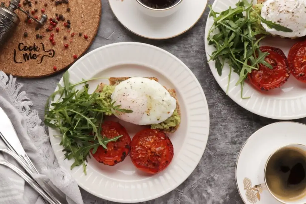 Poached Eggs with Smashed Avocado and Tomatoes