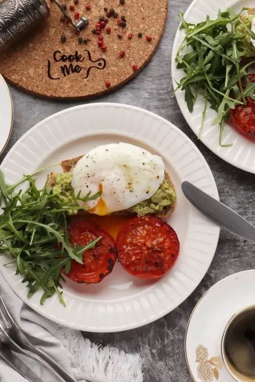 Poached Eggs with Smashed Avocado and Tomatoes