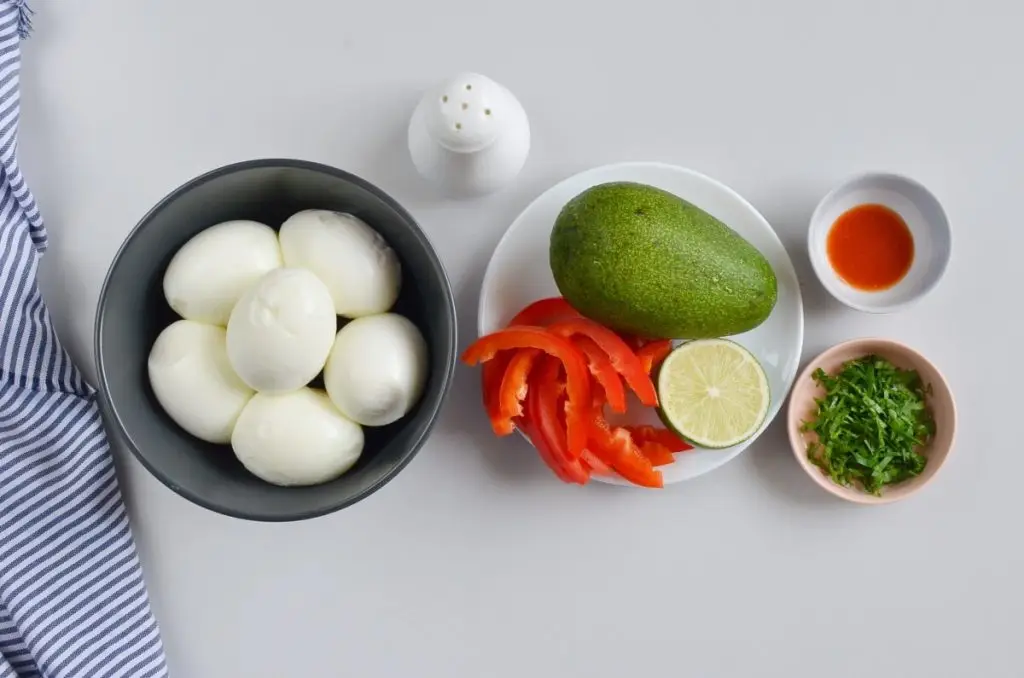 Ingredients for Devilish Avocado Sriracha Deviled Eggs