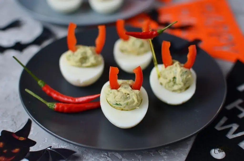 Devilish Avocado Sriracha Deviled Eggs
