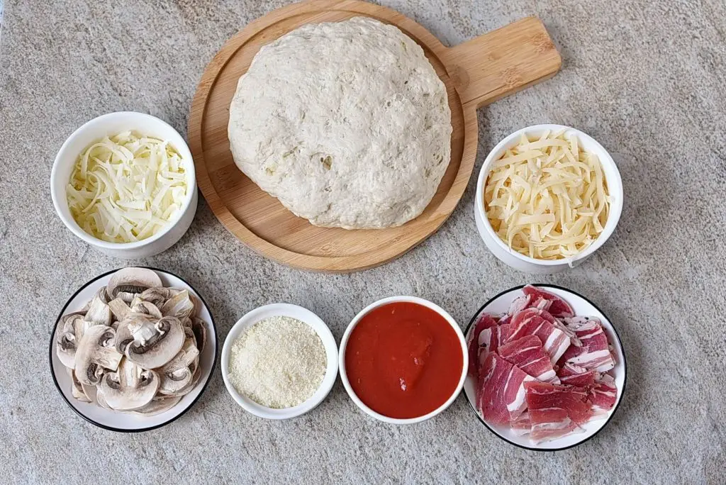 Ingredients for Three-Cheese Pizza with Pancetta and Mushrooms