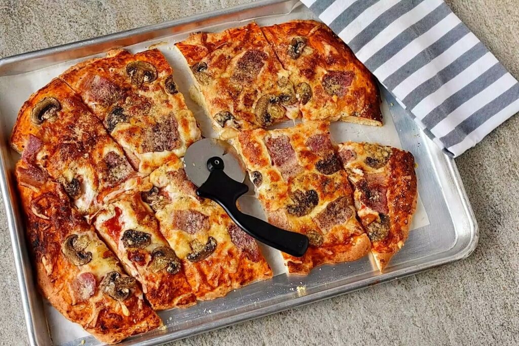How to serve Three-Cheese Pizza with Pancetta and Mushrooms